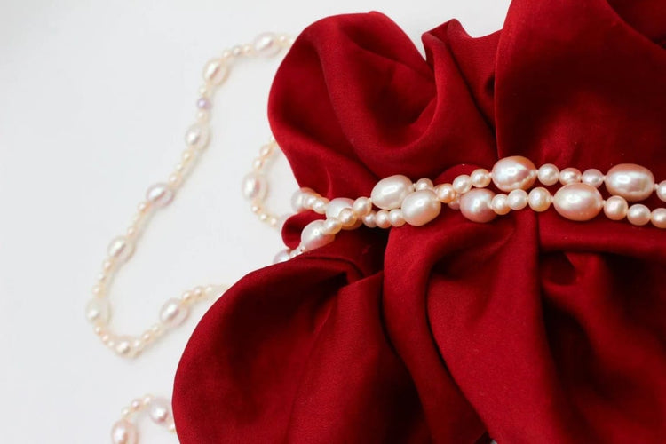 Collier Collier sautoir de perles d’eau douce roses et blanches 58 Facettes 240361