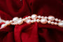 Collier Collier sautoir de perles d’eau douce roses et blanches 58 Facettes 240361