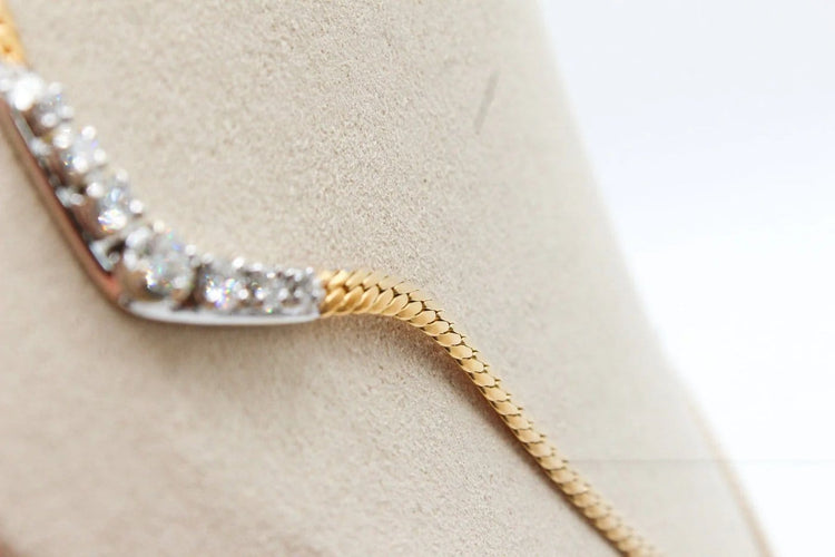 Collier Collier maille anglaise en or jaune 750 avec diamants 58 Facettes 250197