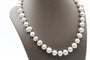 Collier Collier de perles d’eau douce grises en or jaune 750 58 Facettes 240134