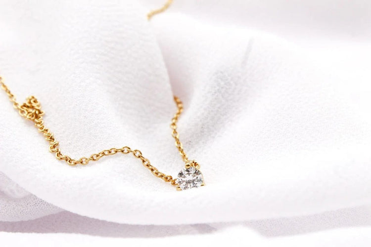 Collier Collier point lumineux en or jaune 750 et diamant 58 Facettes 250133
