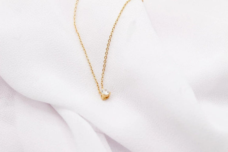 Collier Collier point lumineux en or jaune 750 et diamant 58 Facettes 250133