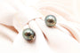 Boucles d'oreilles Boucles d'oreilles pendantes en or jaune 18 carats et perles de Tahiti 58 Facettes 250193