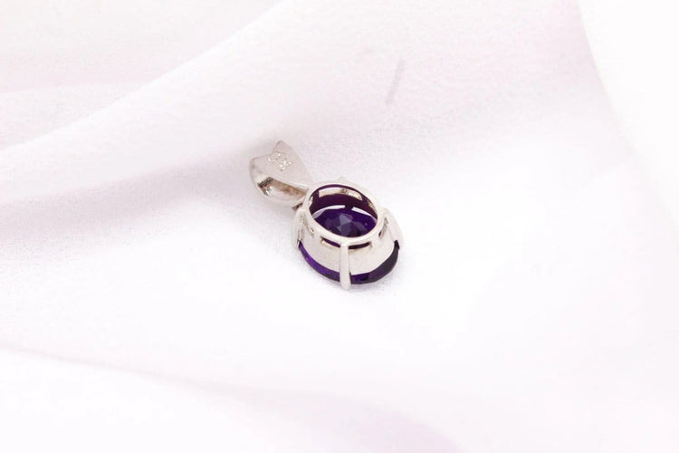 Pendentif Pendentif en or blanc 750 serti d’améthyste 58 Facettes 250259