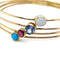 Bracelet Bracelet ancien à 4 joncs en or jaune 18 ct et pierres 58 Facettes