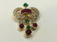 Pendentif Pendentif nœud en or jaune 18 ct rubis, émeraudes et diamants 58 Facettes