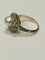 Bague 54 Bague ancienne en or jaune 18 carats, perle fine et diamants 58 Facettes