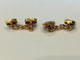 Boutons de manchette Boutons de manchette en or jaune 18 ct et grenats 58 Facettes