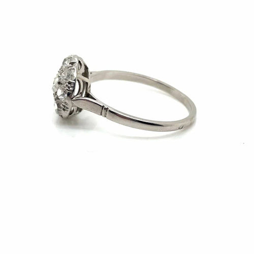 Bague 57 Bague Marguerite ancienne en platine et diamants 58 Facettes