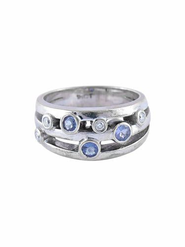 Bague 54 Bague bandeau en or blanc et diamants avec tanzanites 58 Facettes