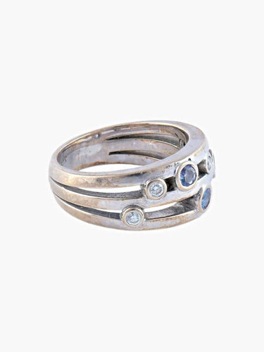 Bague 54 Bague bandeau en or blanc et diamants avec tanzanites 58 Facettes