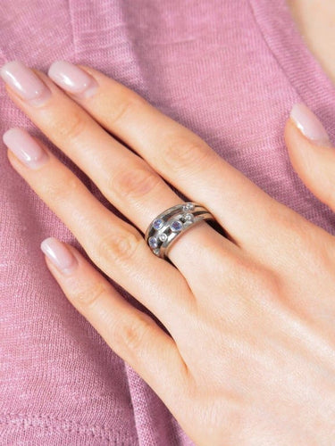 Bague 54 Bague bandeau en or blanc et diamants avec tanzanites 58 Facettes