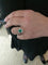 Bague 56 Bague marguerite en or blanc avec émeraude et diamants 58 Facettes