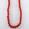 Collier Collier boules de corail rouge en or jaune 750 58 Facettes
