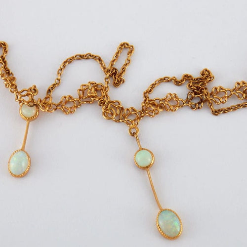 Collier Collier draperie en or jaune 18 ct et opales 58 Facettes