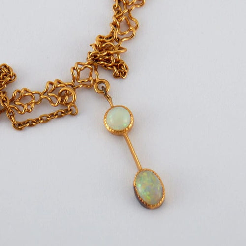 Collier Collier draperie en or jaune 18 ct et opales 58 Facettes
