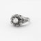 Bague 55 Bague dôme en or blanc 750 sertie de diamants 58 Facettes