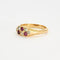 Bague 55 Bague jarretière ancienne en or jaune, rubis et diamants 58 Facettes