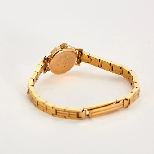 Montre Sygma-Valmon - Montre mécanique dame en or jaune 750 58 Facettes