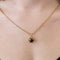 Pendentif Pendentif ancien en or jaune 18 ct, grenat cabochon et diamants 58 Facettes