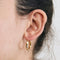 Boucles d'oreilles Créoles facettées en or rose 18 ct 58 Facettes