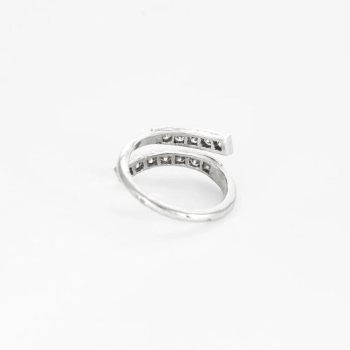 Bague 52 Bague vague en or blanc 18 ct et platine, diamants 58 Facettes