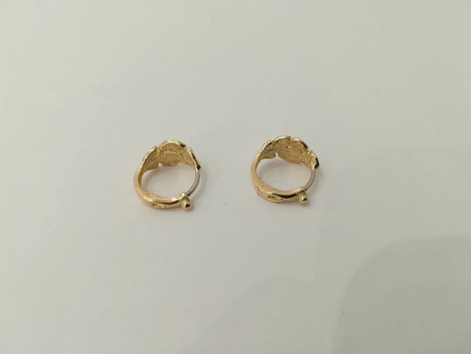 Boucles d'oreilles Boucles d'oreilles feuilles en or jaune et or blanc 18K 58 Facettes