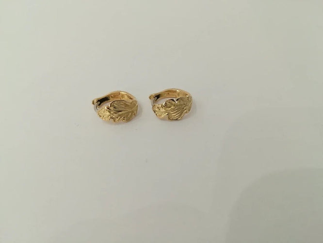 Boucles d'oreilles Boucles d'oreilles feuilles en or jaune et or blanc 18K 58 Facettes