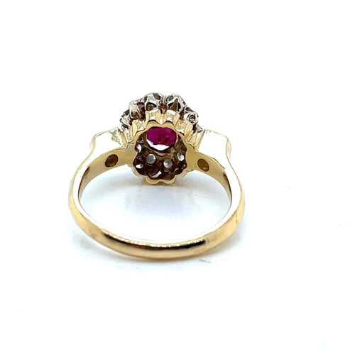 Bague 53 Bague marguerite ancienne en or jaune, rubis et diamants 58 Facettes