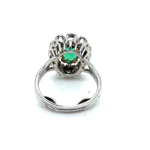 Bague 60 Bague marguerite - Émeraude ovale et diamants en or blanc et platine 58 Facettes