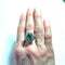Bague 60 Bague marguerite - Émeraude ovale et diamants en or blanc et platine 58 Facettes