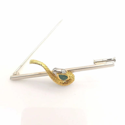 Broche Broche serpent en or jaune et blanc 18 carats émeraude et diamants 58 Facettes