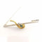 Broche Broche serpent en or jaune et blanc 18 carats émeraude et diamants 58 Facettes
