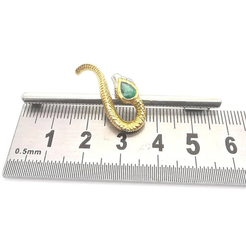 Broche Broche serpent en or jaune et blanc 18 carats émeraude et diamants 58 Facettes