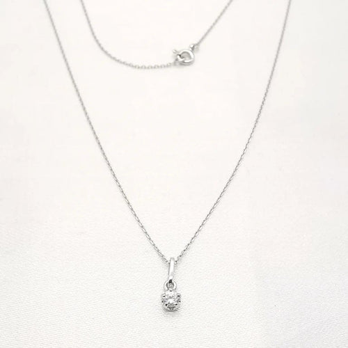 Collier Collier avec pendentif en or blanc 18 carats et diamant 0,15 ct 58 Facettes