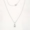Collier Collier avec pendentif en or blanc 18 carats et diamant 0,15 ct 58 Facettes