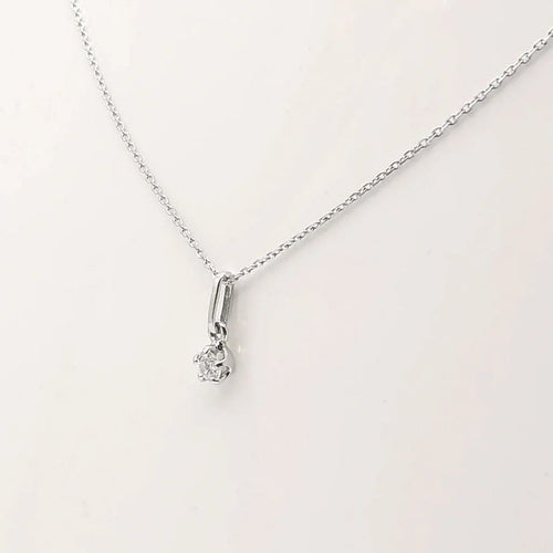 Collier Collier avec pendentif en or blanc 18 carats et diamant 0,15 ct 58 Facettes
