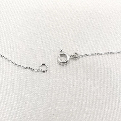 Collier Collier avec pendentif en or blanc 18 carats et diamant 0,15 ct 58 Facettes