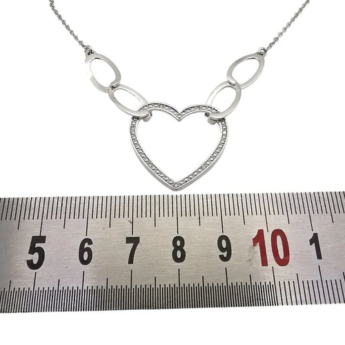 Collier Collier maille forçat cœur en or blanc 18 carats et diamants 58 Facettes