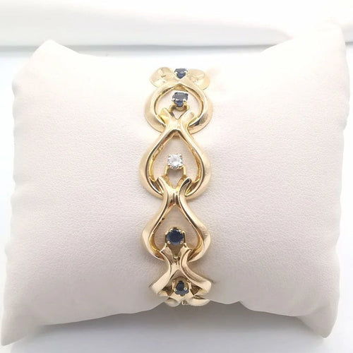 Bracelet Bracelet en or jaune 18 carats avec diamants et saphirs 58 Facettes
