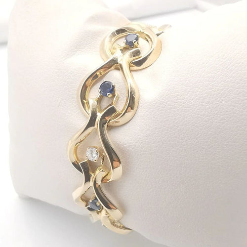 Bracelet Bracelet en or jaune 18 carats avec diamants et saphirs 58 Facettes