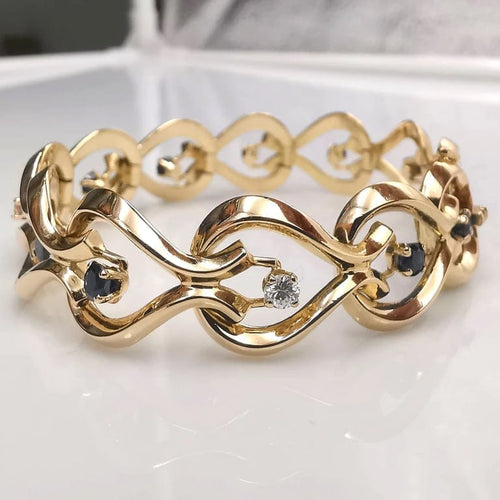 Bracelet Bracelet en or jaune 18 carats avec diamants et saphirs 58 Facettes