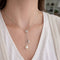 Collier Collier en or blanc 18 carats avec perle 58 Facettes