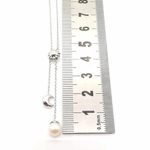 Collier Collier en or blanc 18 carats avec perle 58 Facettes