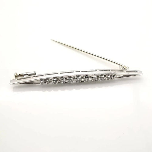 Broche Broche ancienne en or blanc 18 carats et diamants 58 Facettes