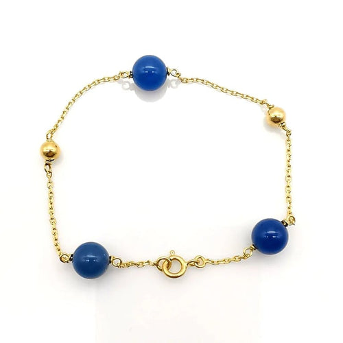Bracelet Bracelet en or jaune 18 carats avec perles bleues 58 Facettes
