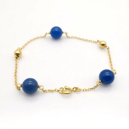 Bracelet Bracelet en or jaune 18 carats avec perles bleues 58 Facettes