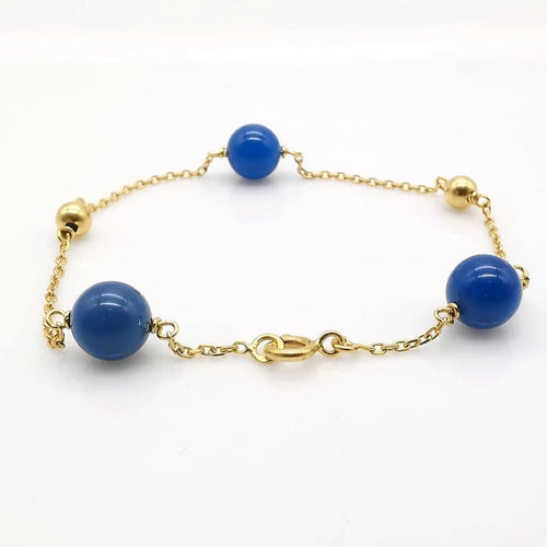 Bracelet Bracelet en or jaune 18 carats avec perles bleues 58 Facettes