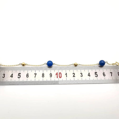 Bracelet Bracelet en or jaune 18 carats avec perles bleues 58 Facettes