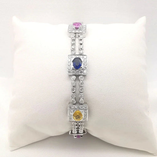 Bracelet Bracelet en or blanc 18 carats saphirs multicolores et diamants 58 Facettes Bracelet or blanc saphirs diamants certifié HRD Anvers